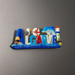 Decorative sign with 'ALGARVE' and ocean-themed characters on a gray background