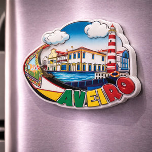 Aveiro souvenir magnet placed on a fridge with illustrated moliceiro boat, canals, lighthouse and waterfront buildings