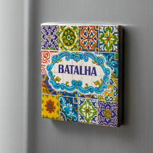 Decorative tile with colorful patterns and 'Batalha' text on a gray background