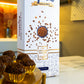 Portugal brigadeiro cooking kit packaging displayed next to finished chocolate brigadeiros