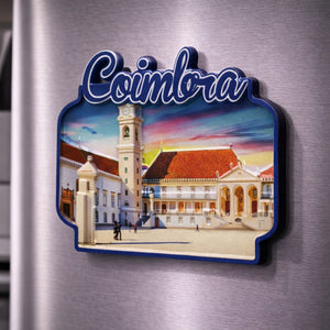 Coimbra souvenir magnet with historic university buildings and traditional architecture placed on a fridge
