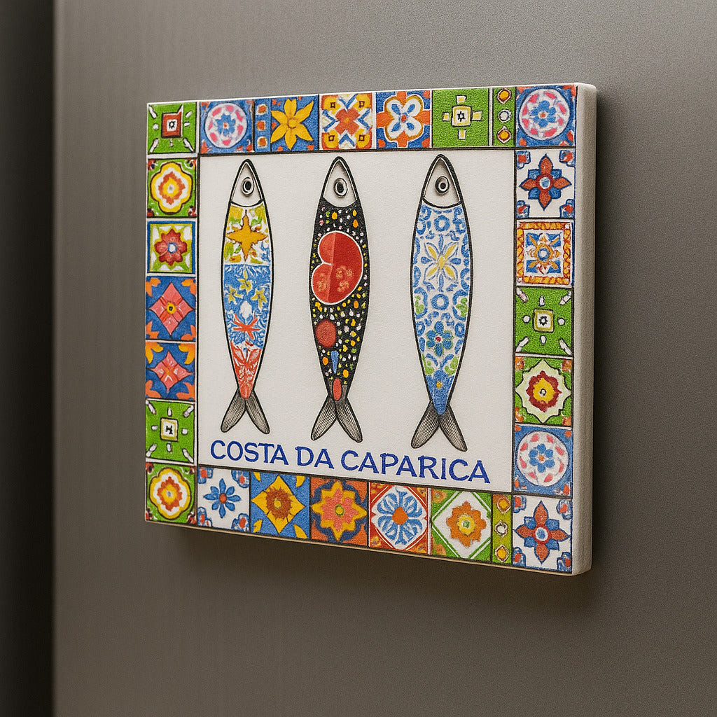 Decorative tile with three fish illustrations and a colorful border on a gray background