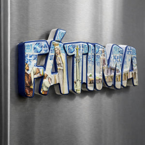 Fátima souvenir magnet  placed on a fridge with azulejo-style lettering, sanctuary architecture, and religious imagery from Portugal