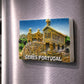 Gerês Portugal souvenir magnet placed on a fridge featuring a raised monument design with crosses, stone textures, and mountain landscape relief