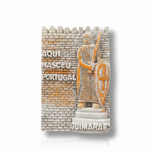 Guimarães souvenir magnet with medieval warrior relief, shield, sword and “Aqui Nasceu Portugal” text