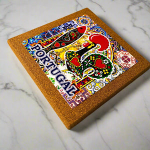Close-up of ceramic tile on cork trivet with traditional Portuguese patterns
