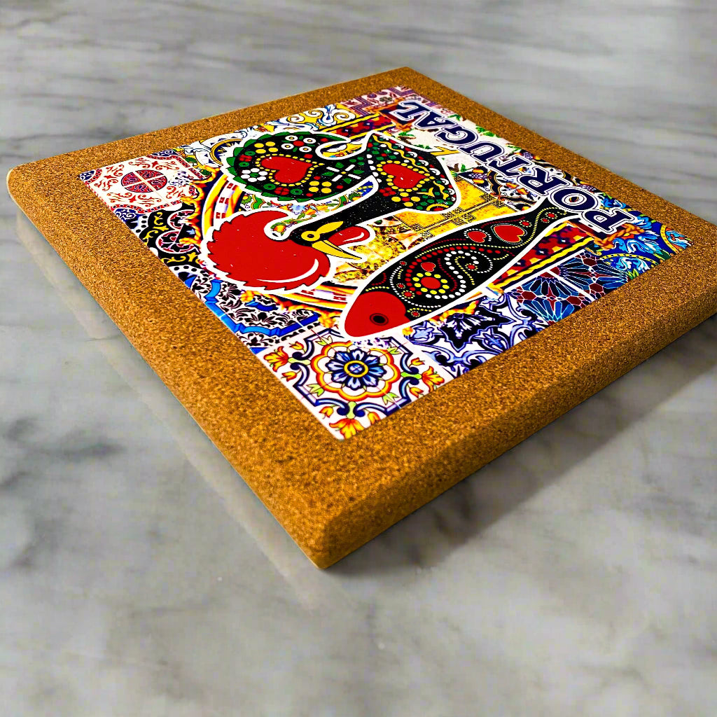 Overhead view of cork trivet with Portugal tile, rooster and sardine illustration