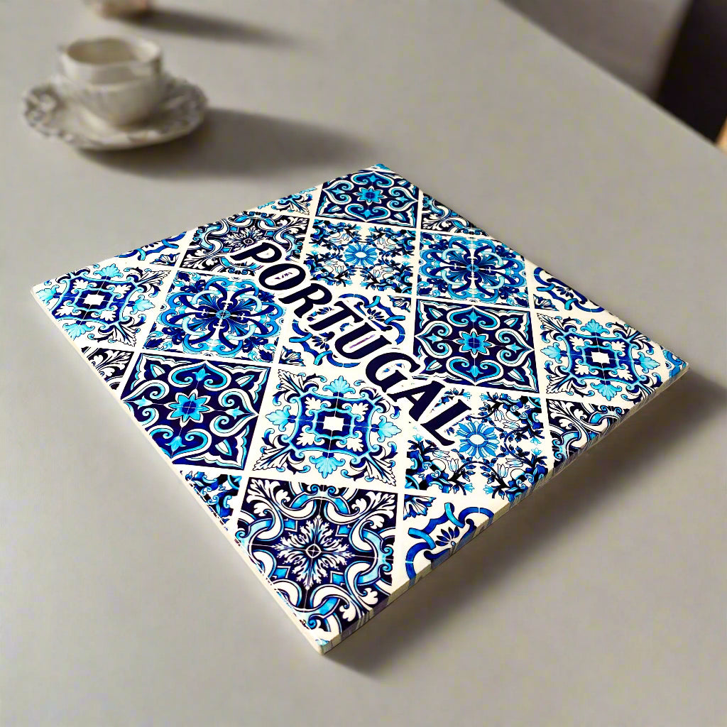 Decorative tile with Portuguese design and 'Portugal' text on a beige surface