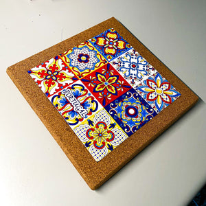 Cork trivet showing nine-tile azulejo mosaic design from Portugal