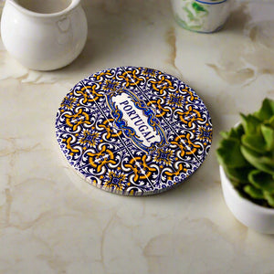 Decorative plate with Portuguese design on a plain background