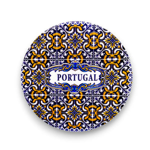 Decorative plate with Portuguese tile pattern and 'Portugal' text on a white background