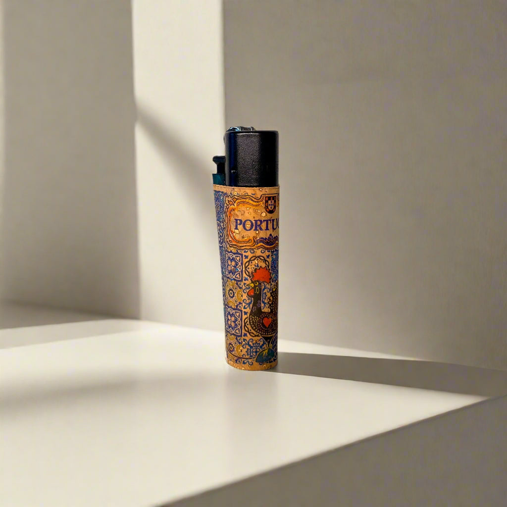 Decorative lighter with intricate designs on a plain background