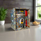 Decorative box with colorful mosaic design on a table