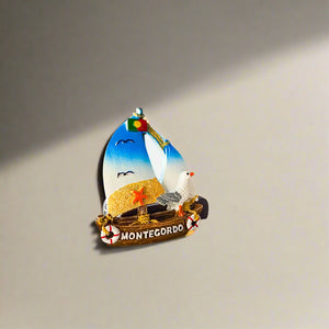 Monte Gordo Fridge Magnet – Portugal Souvenir with Sailboat, Seagull and Beach Design