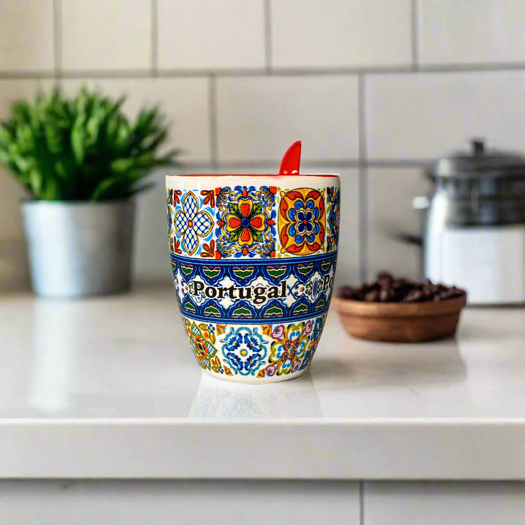 Colorful ceramic mug with 'Portugal' text on a plain background