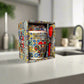 Decorative mug with colorful patterns and 'Portugal' text in a matching box on a light background