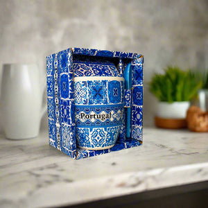Ceramic mug with blue and white pattern and 'Portugal' text, placed in a decorative box.