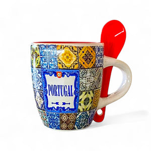 Colorful coffee cup with 'Portugal' text and a red spoon on a white background