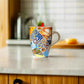 Algarve Ceramic Souvenir Mug with Scenic Coastal Landmarks, Azulejo Tile Band and Red Spoon – Gift Box Included
