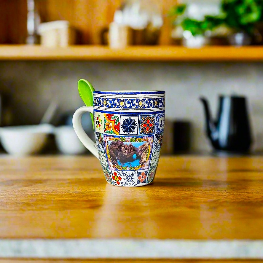 A close-up of a decorative Algarve-themed mug with intricate tile designs. The mug’s 'ALGARVE' label is prominently displayed, making this item a perfect souvenir from Portugal's scenic southern region.