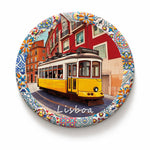 Lisbon ceramic coaster featuring iconic yellow tram and traditional Portuguese tile patterns