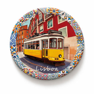 Lisbon ceramic coaster featuring iconic yellow tram and traditional Portuguese tile patterns