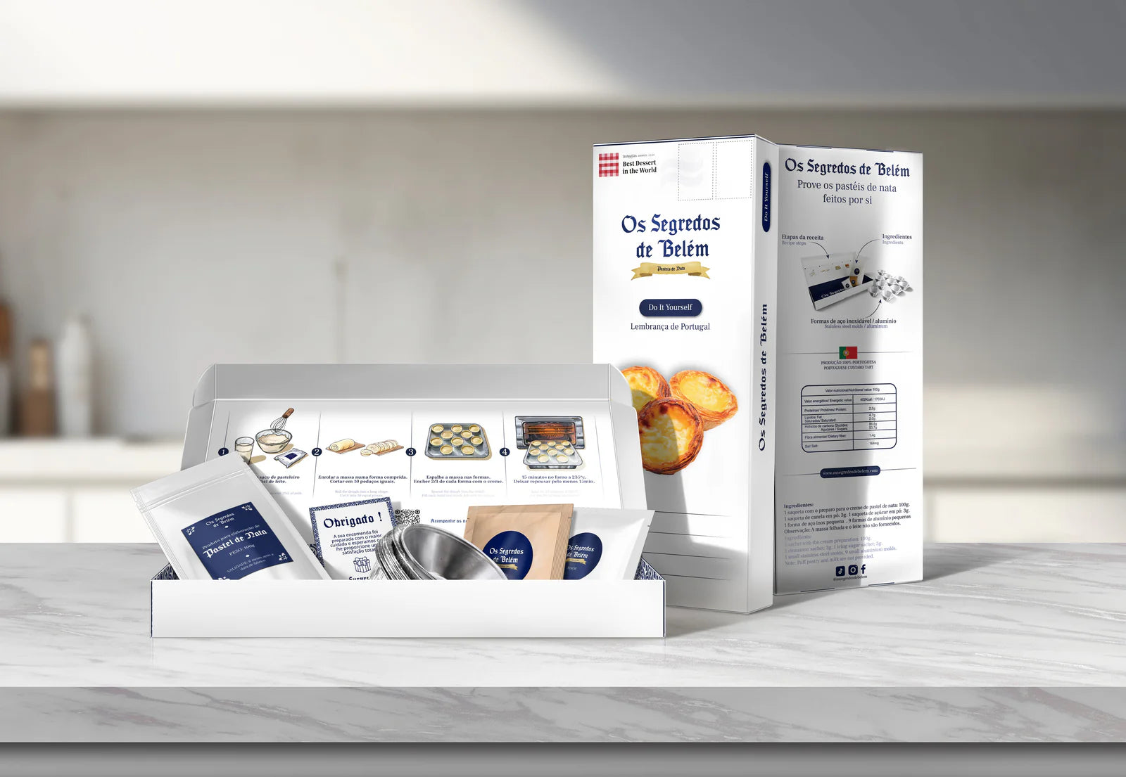Complete Lisbon pastel de nata cooking kit with ingredients, molds and packaging displayed