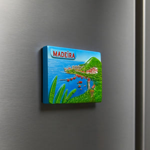Fridge magnet with Madeira island illustration on a metallic surface