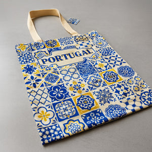 Tote bag with Portuguese tile pattern and 'Portugal' text on a gray background