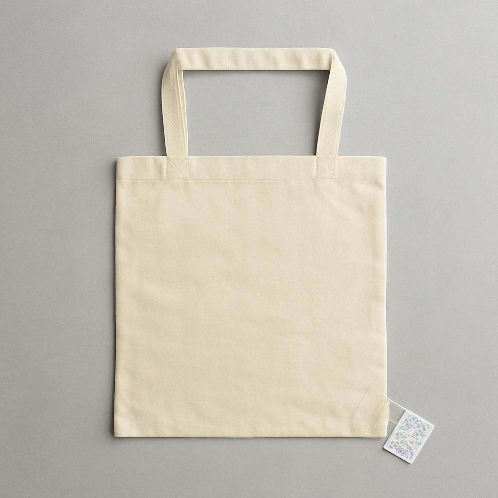 Beige tote bag on a gray background