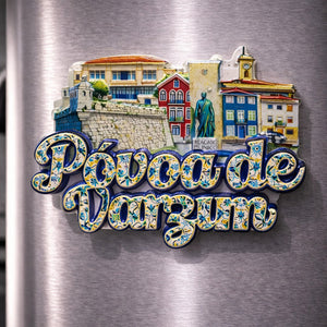 Póvoa de Varzim souvenir magnet placed on a fridge featuring classic city monuments, azulejo-style lettering, and the iconic casino landmark in Portugal