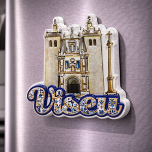 Viseu souvenir magnet placed on a fridge with illustrated historic cathedral, religious architecture and tile-inspired lettering